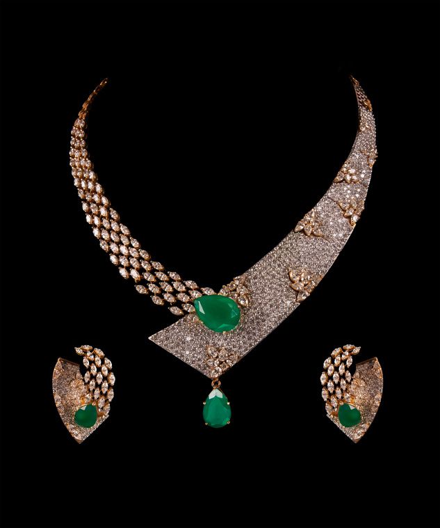 Emerald and diamond necklace set with earrings